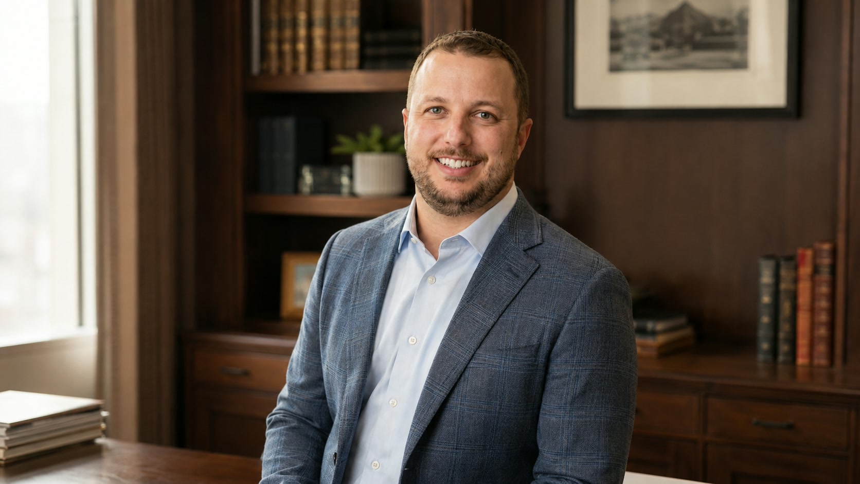 Jeff Hollenbeck, principal of Nellis Holdings, in a professional office setting